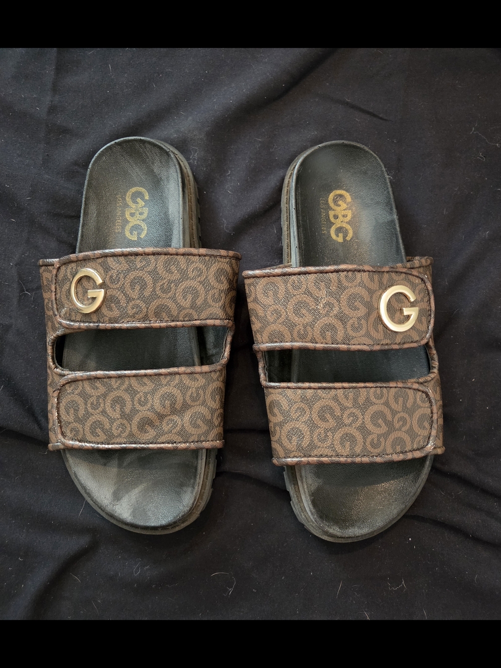 G by Guess Brown Monogram Slide Sandals with Gold 'G' Accent